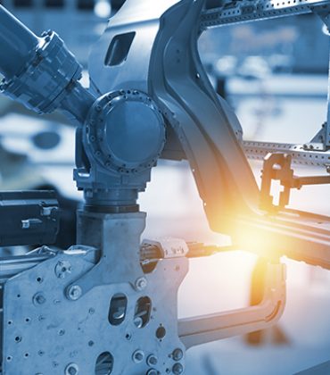 Líneas flexibles de montaje de Frontales, Palancas de cambio y Frenos de mano. Células robotizadas de soldadura por ultrasonidos, wraping, desbarbado y control por visión artificial de piezas de fundición , y secuenciado de componentes Just In Time.